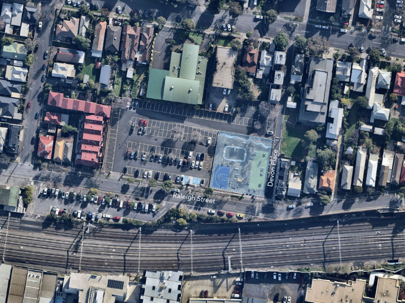 Current: Aerial view of the Raleigh Street car park. The existing park footprint is marked by a blue box.