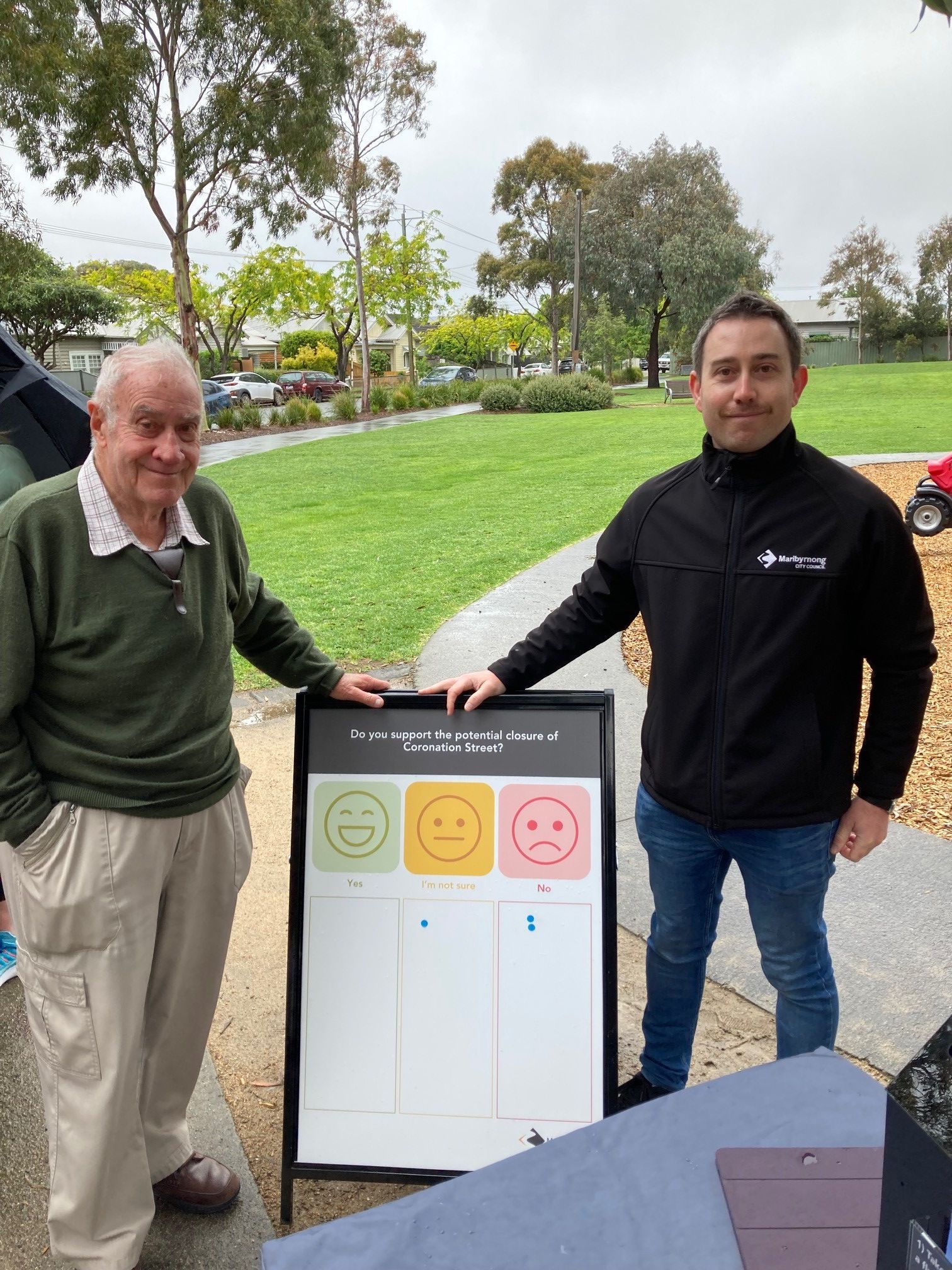 A community member and Council staff member at Beevers Reserve.